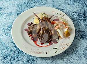 grilled lamb chops with mashed potato and egg served in plate isolated on background top view of italian food