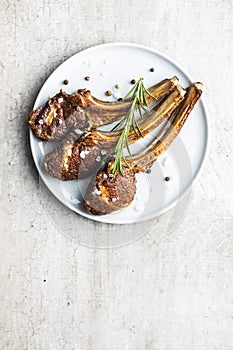 Grilled lamb chops on plate