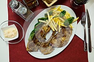 Grilled lamb chops with sauce allioli photo