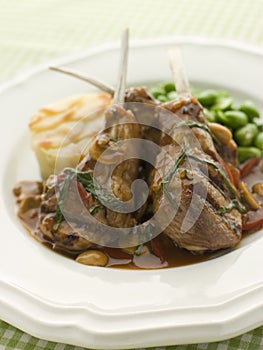 Grilled Lamb Cutlets Chasseur sauce Pomme Anna photo