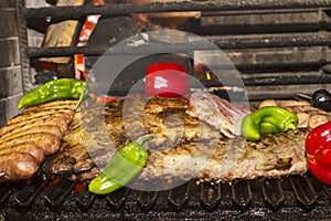 Grilled lamb ribs and spicy pork sausage