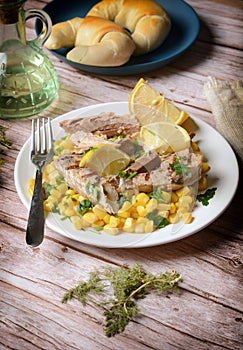 Grilled mackerel fillets with corn garnish