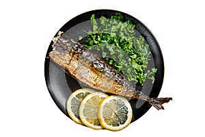 Grilled Mackerel Scomber fish on a plate with greens and lemon. Isolated on white background.