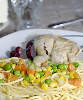 Grilled marinaded chicken leg served with garnish