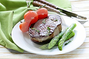 Grilled meat beef steak with vegetable garnish