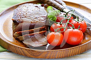 Grilled meat beef steak with vegetable garnish