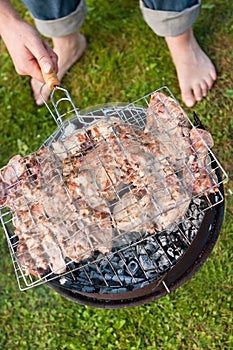 Grilled meat on a charcoal grill