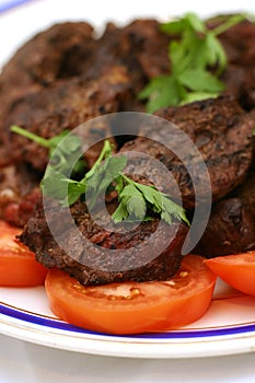 Grilled meat on dish