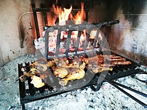 Grilled meat on fireplace