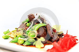 Grilled meat with green bean peas food portion white background isolated