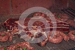 Grilled Meat Medley: A Mouthwatering Assortment of Sausages and Mixed Cuts on the Barbecue