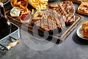 Grilled meat served with side dishes