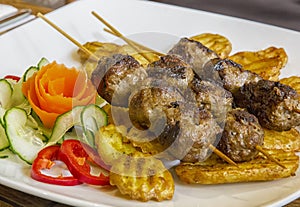 Grilled meat skewers