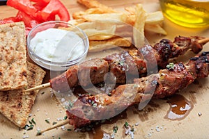 Grilled meat skewers on a table