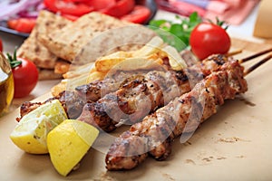 Grilled meat skewers on a table