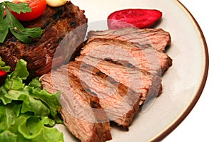 Grilled meat steak on dish