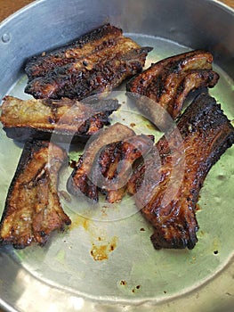 Grilled meat to the point of charring may potentially be a carcinogen