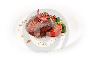 Grilled meat with tomoatoes and chilly on white background