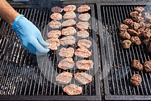 Grilled meatballs at picnic in rotisserie