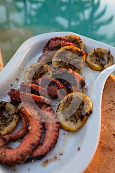 Grilled octopus during a Hawaiian sunset