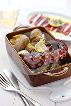 Grilled octopus with potatoes, polvo lagareiro, Portuguese cuisine