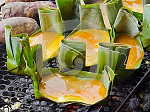 Grilled omelet or egg omelette on banana leaf or Khai Parm trad