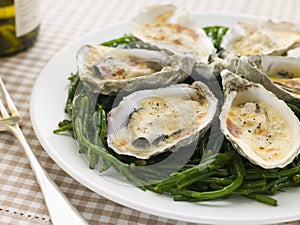 Grilled Oysters with Mornay Sauce on Samphire