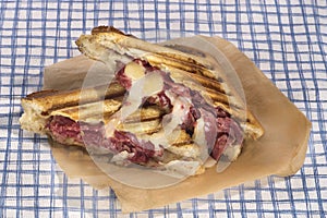 Grilled pastrami and cheese sandwich