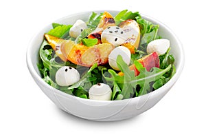 Grilled Peach Salad with Arugula and Mozzarella Cheese Pearls on White Isolated