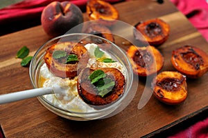 Grilled peaches and Greek yoghurt for a healthy alkaline breakfast