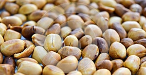 Grilled peanuts, snack ready to eat for watching the movies on the holiday.