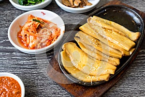 Grilled Pleurotus Eryngii dish on the Wood Table.