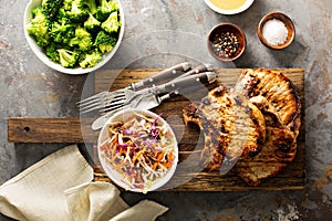 Grilled pork chops with cole slaw salad