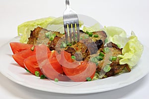 Grilled pork chops with vegetables