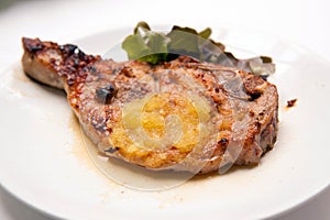 Grilled pork chops with vegetables and pineapple sauce