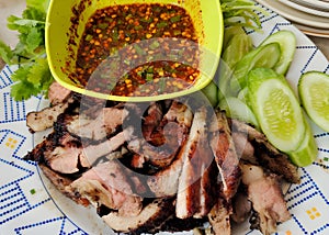 grilled pork meat with vegetables and spices