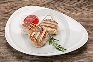 Grilled pork medallion with sauce