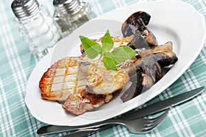 Grilled pork with mushrooms