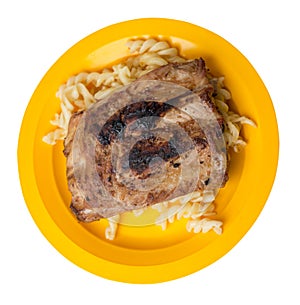 Grilled pork ribs with pasta. grilled pork ribs on a  plate isolated on white background top view