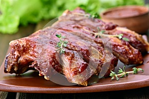 Grilled pork ribs on plate