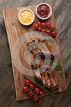 Grilled Pork Ribs On Wooden Board