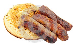 Grilled Pork Sausages On A Buttered Crumpet