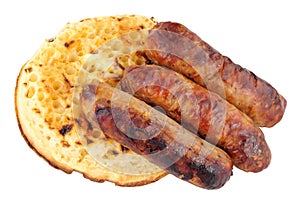 Grilled Pork Sausages On A Buttered Crumpet