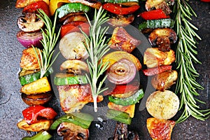 Grilled pork shish or kebab on skewers with vegetables . Food background shashlik