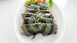 Grilled Pork Wrapped in Wild Betel Leaf