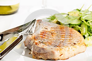 Grilled porkchop with side salad