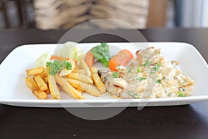 Grilled Porkchop on wood background