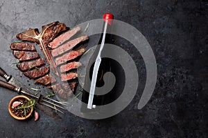 Grilled porterhouse beef steak. Sliced T-bone