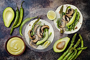 Grilled portobello, asparagus, bell peppers, green beans fajitas. Poblano mushroom tacos with jalapeno, cilantro, avocado crema