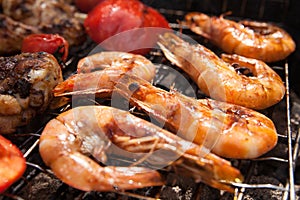 Grilled prawns on the barbecue rack at the garden party